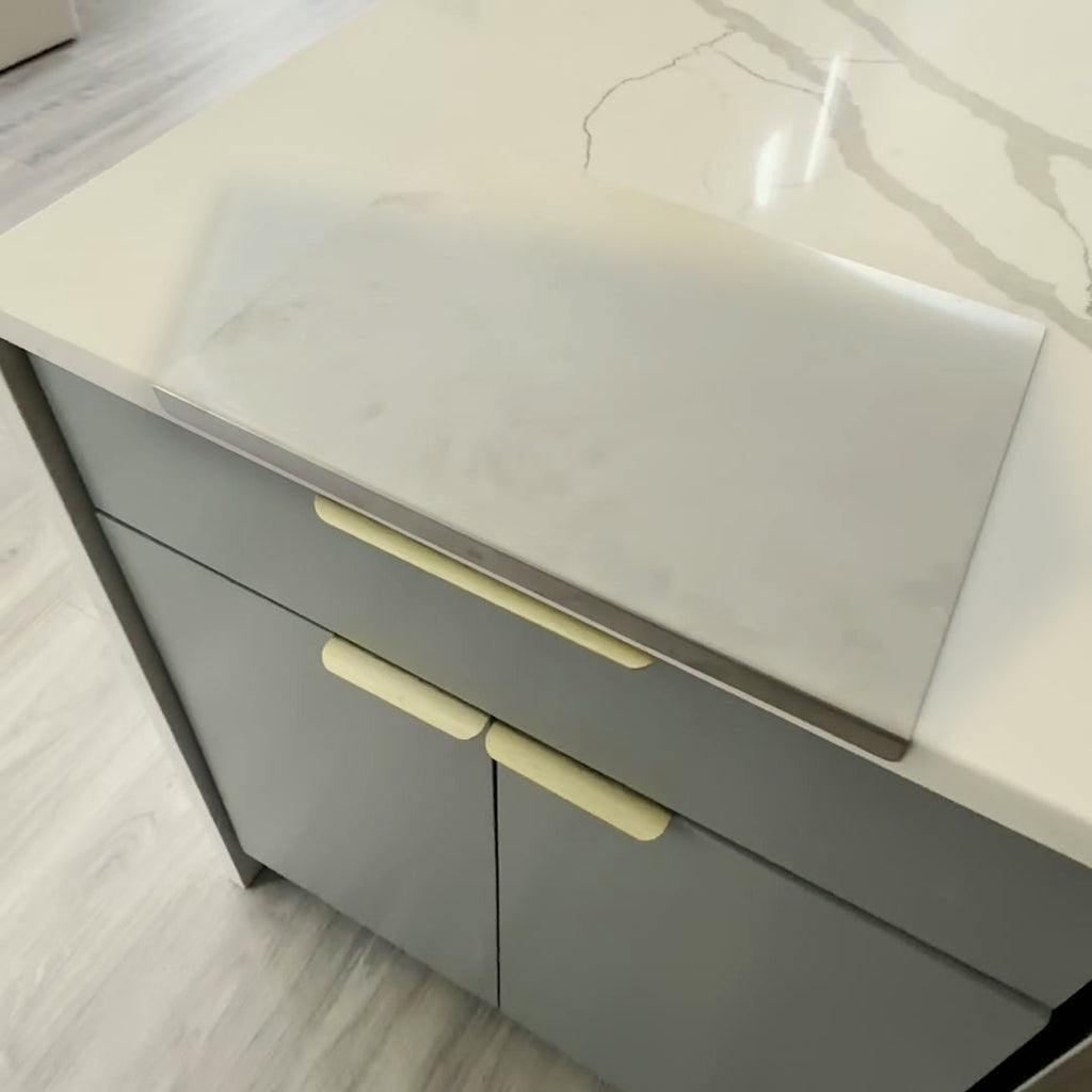 Prep board in place on a kitchen island corner